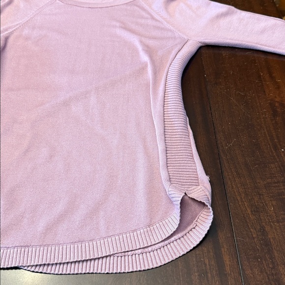 Lululemon lavender sweater with design on sides.  Sole owner Excellent condition - Picture 8 of 9